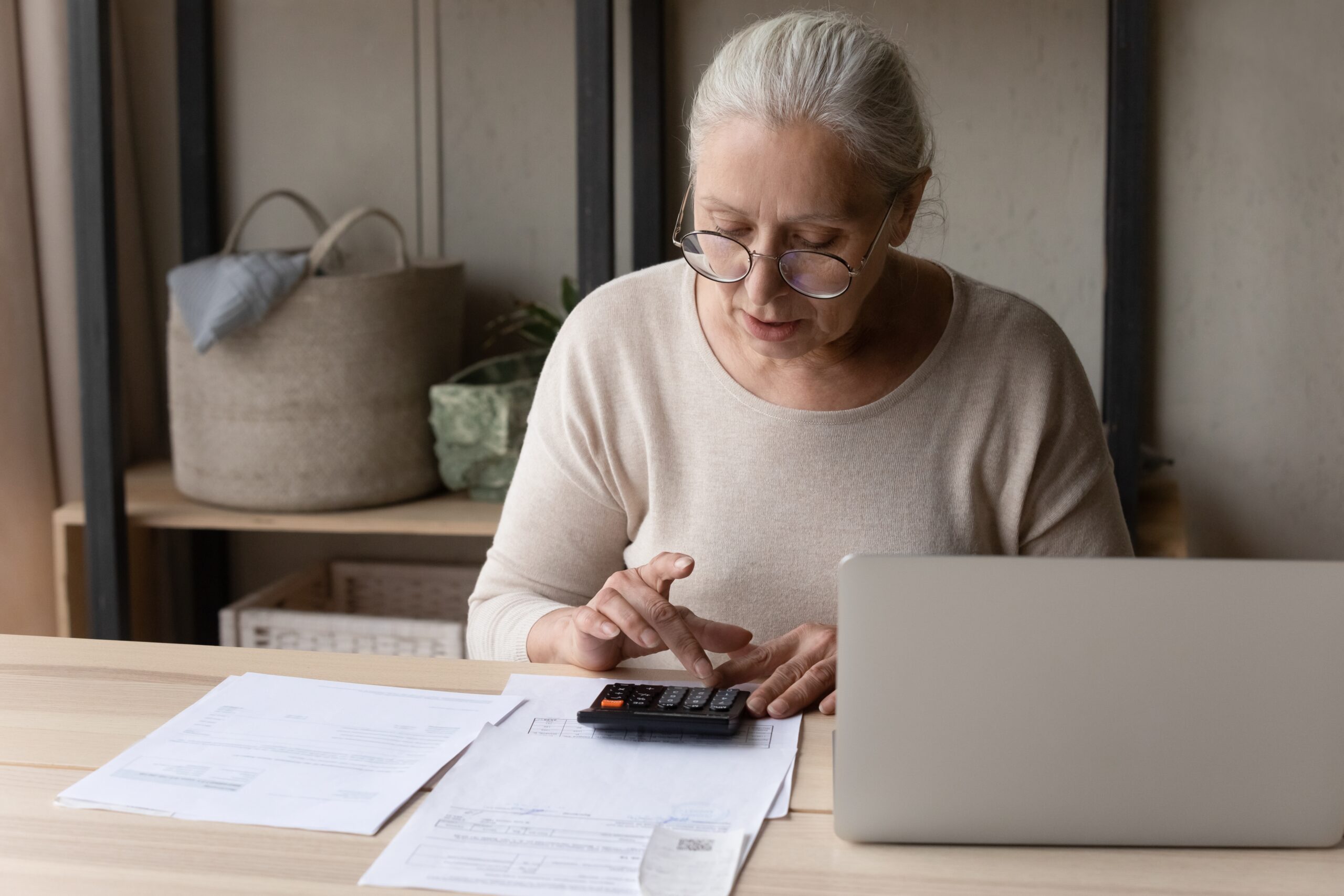 Lady using calculator